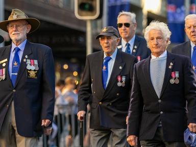Over 9,000 current serving members and veterans of the Australian Defence Force file past the Anzac Memorial to pay thei...