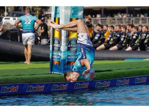 Experience the thrill of full-contact rugby played on a floating pitch in Darling Harbour. Witness big hits, big splashe...