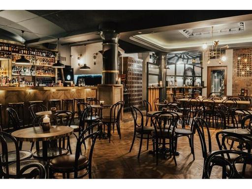 With a name that perfectly describes its location, Beneath Driver Lane is a bar occupying the underground space that use...