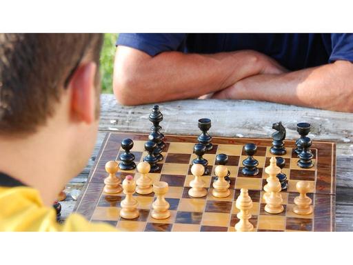 Could you beat a chess master? Get up close and personal with a champion and play casual a game of chess. Bring your A-g...