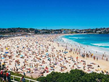 Bondi Beach, Sydney's iconic coastline, offers golden sands, azure waters, and a vibrant surf culture. From scenic walks to surfing, it encapsulates Australia's unforgettable beach lifestyle.