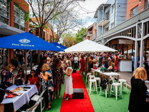 An outdoor street party on Vardon Avenue for a four-hour food and drinks package.Enjoy roving canapes and Pol Roger Cham...