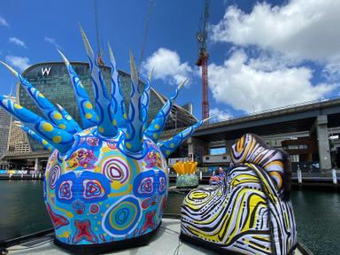 A gigantic, technicolour artwork is afloat in Darling Harbour this summer, representing the tiny, fragile worlds and cre...