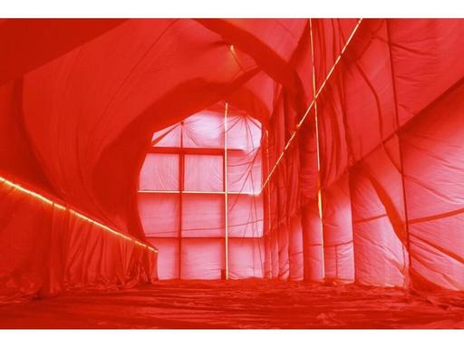 A collaboration between local and international artists, the installation reimagines the building as a warm, immersive w...
