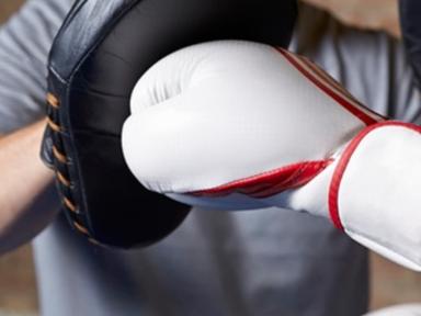 A fitness instructor from KGV facilitates a gym session with a warm up, some weight training and physical therapy exerci... A fitness instructor from KGV facilitates a gym session with a warm up, some weight training and physical therapy exerci...
