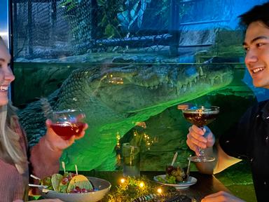 Oh snap! WILD LIFE Sydney Zoo is scaling and tailing up your Halloween celebrations this year with a deliciously wicked pop-up CROCtail Bar inside an underground Crocodile Den. That's right- inside a crocodile den with an actual crocodile.Just a piece of (sturdy and thick) glass will stand between you and the Darling Harbour zoo's mammoth Saltwater Crocodile. His name is Rocky- he is over 4m long and weighs at least 365kg! Don't get on his bad side!Upon arrival- guests will be greeted with a free drink and a rare hands-on reptile encounter (snake or lizard).It's then on to find an allocated seat to order some tasty tapas and cocktails aka CROCtails made by mobile bar company Trolley'd using locally and responsibly sourced native and wild foraged ingredients such as roasted wattle- urban beehive honey and Illawarra Plum Vodka.The evening kicks on when the WILD LIFE Sydney Zoo team emerge for a Croc Talk and there may even be the chance to watch Rocky feed!&nbsp;Tickets are $15 per person and include a free beer or house wine on arrival. Plus $5 from each ticket sold will be donated to the WILD LIFE Conservation Fund supporting animal research- conservation and welfare.Seating is limited with only 13 spots available per session in the Croc Den and 38 in the Upper Viewing Deck.