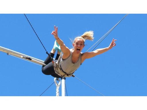 Step up and take your leap of faith with outdoor flying trapeze classes....